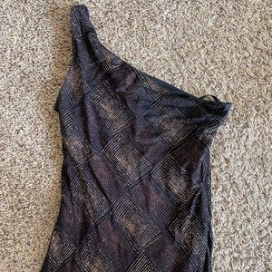 Form fitted one shoulder sparkly gown